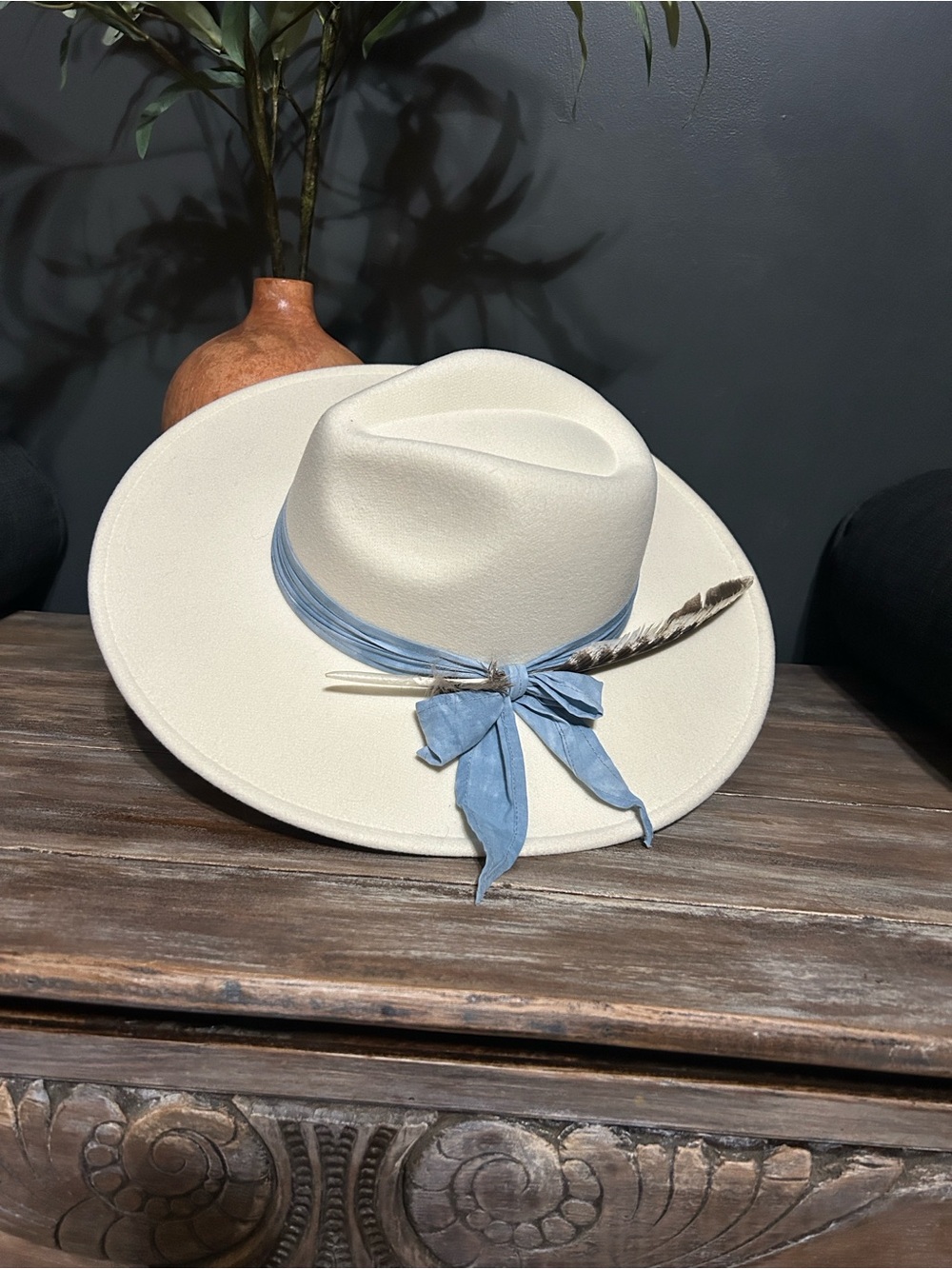 Cream Wide-Brim Hat with Light Blue Ribbon and Feather Accent